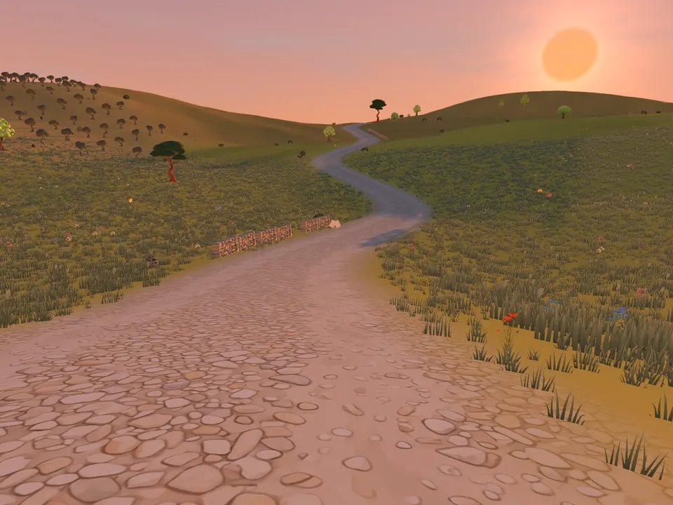 A stone road winding into green hills in the evening sun